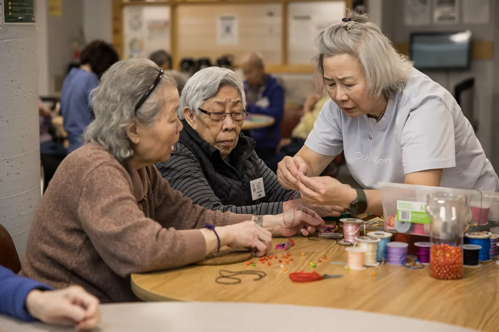 Wing Kei residents and volunteers playing a game